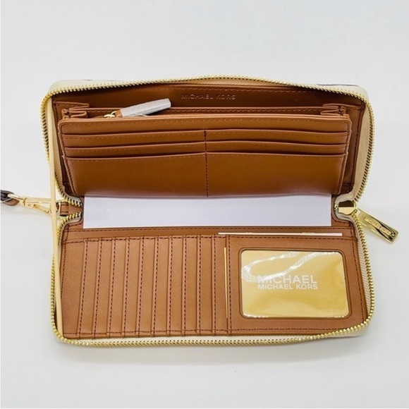 Michael Kors Large Continental Wallet
Wristlet Vanilla/Brown - Picture 6 of 9